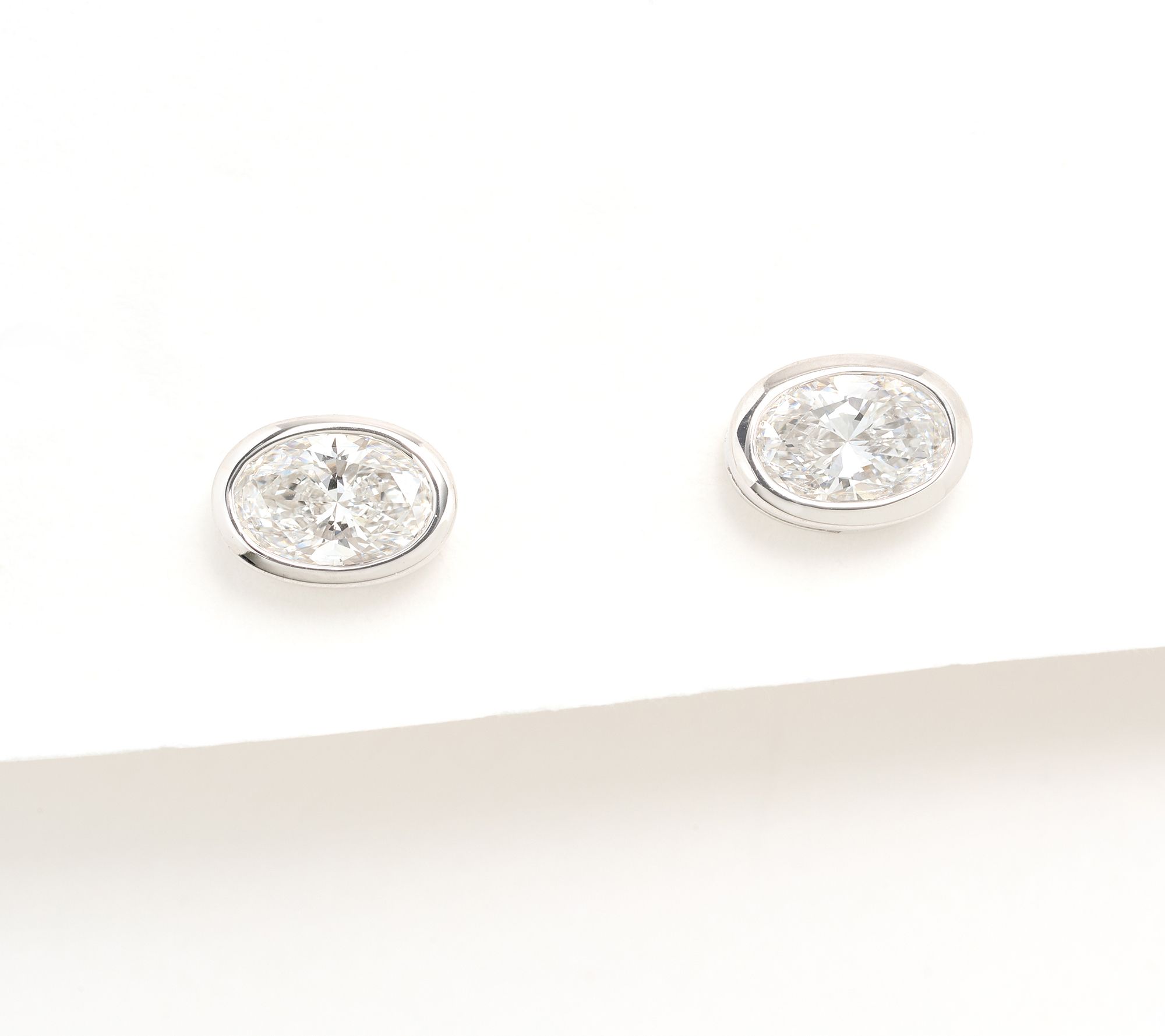 Fire Light Lab Grown Diamond 0.72 cttw Oval Bezel Set Stud Earrings