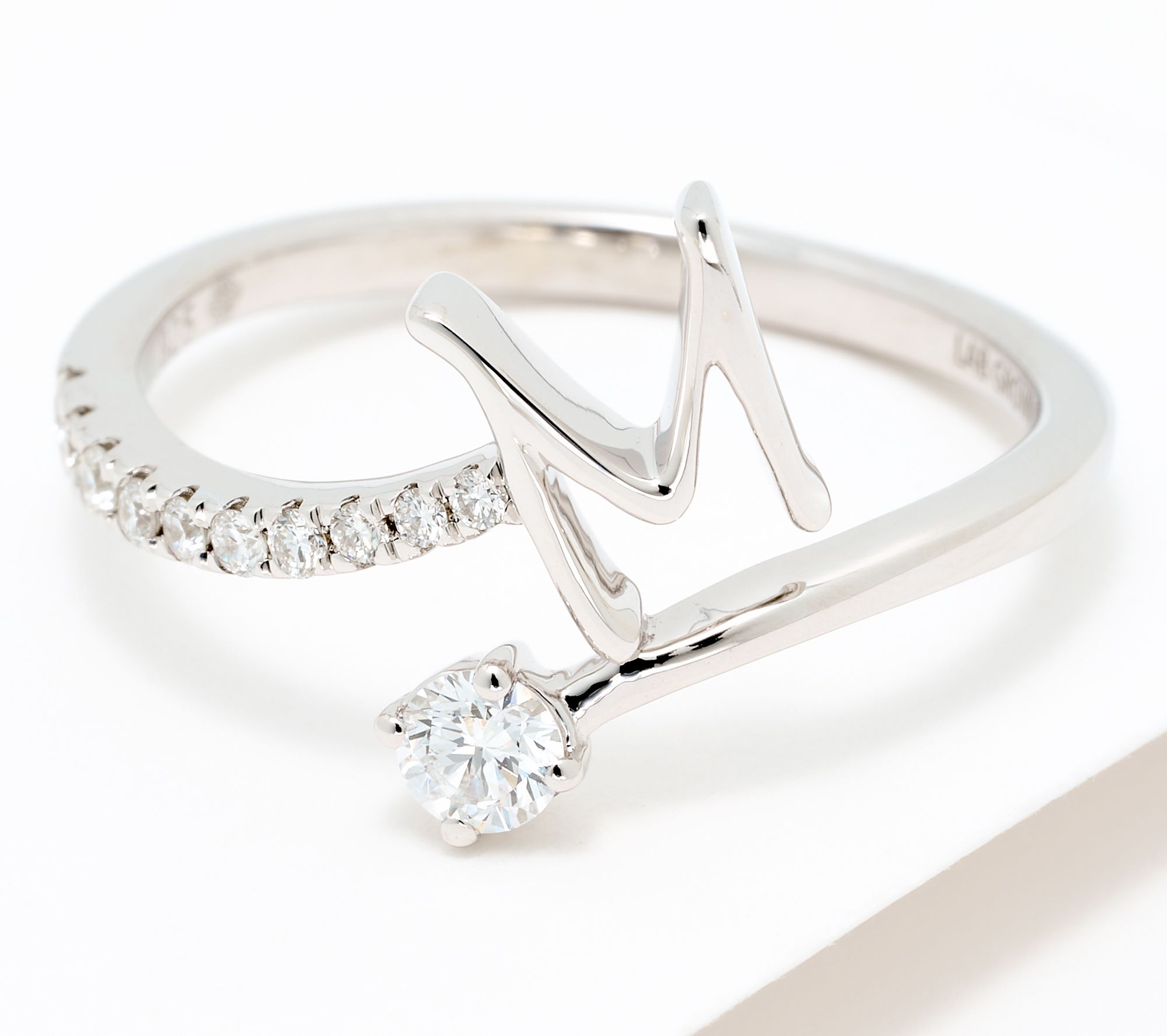 M Initial