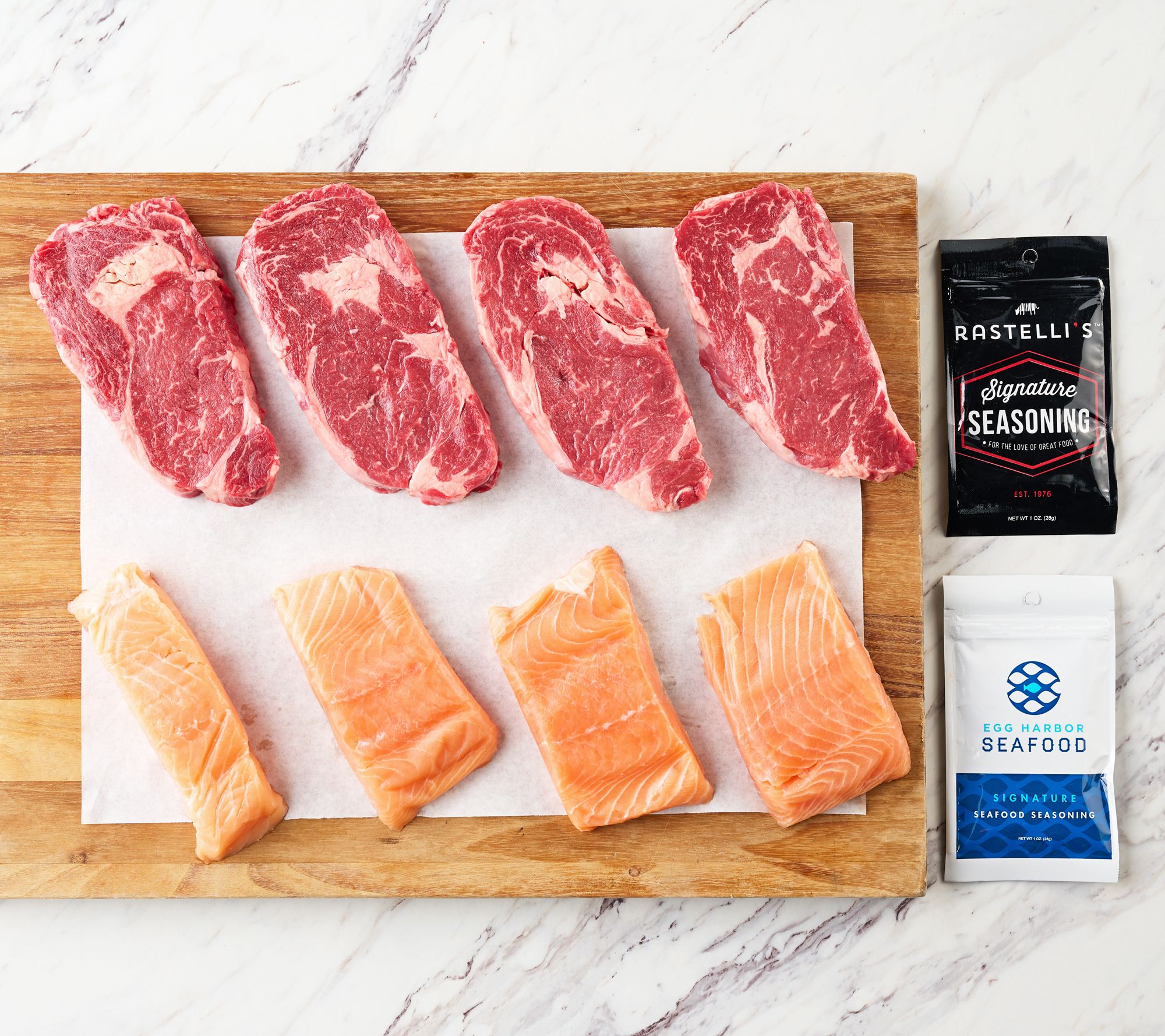 Rastelli's (4) 9 oz. Beef Ribeyes & (4) 6 oz. Salmon AutoDelivery