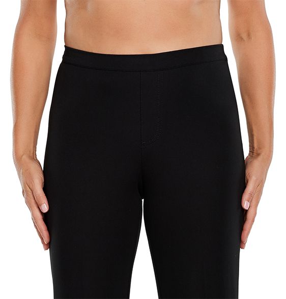 Women's pants with high rise, waistband sits above the natural waist.
