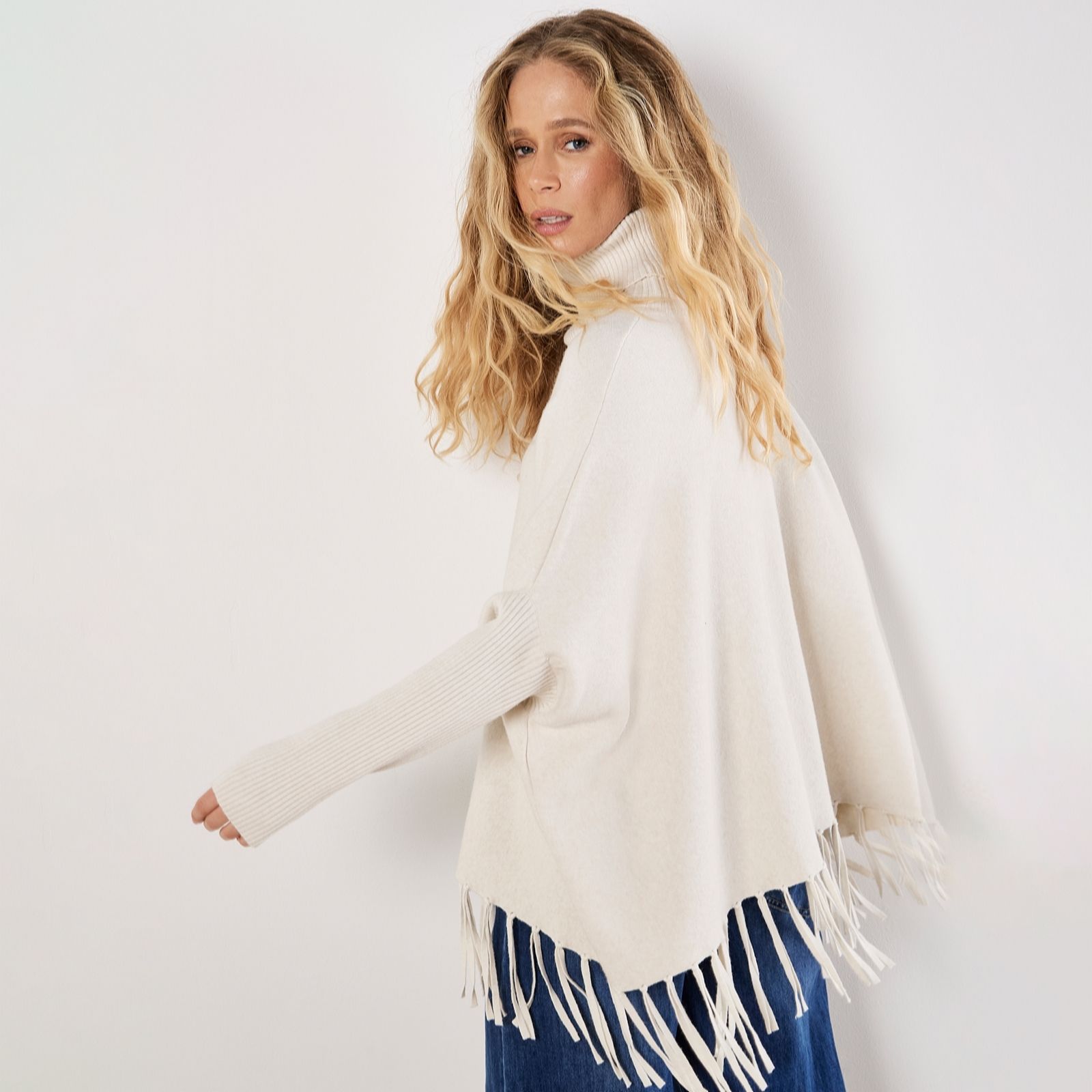 Apricot Roll Neck Fringed Ponch Jumper