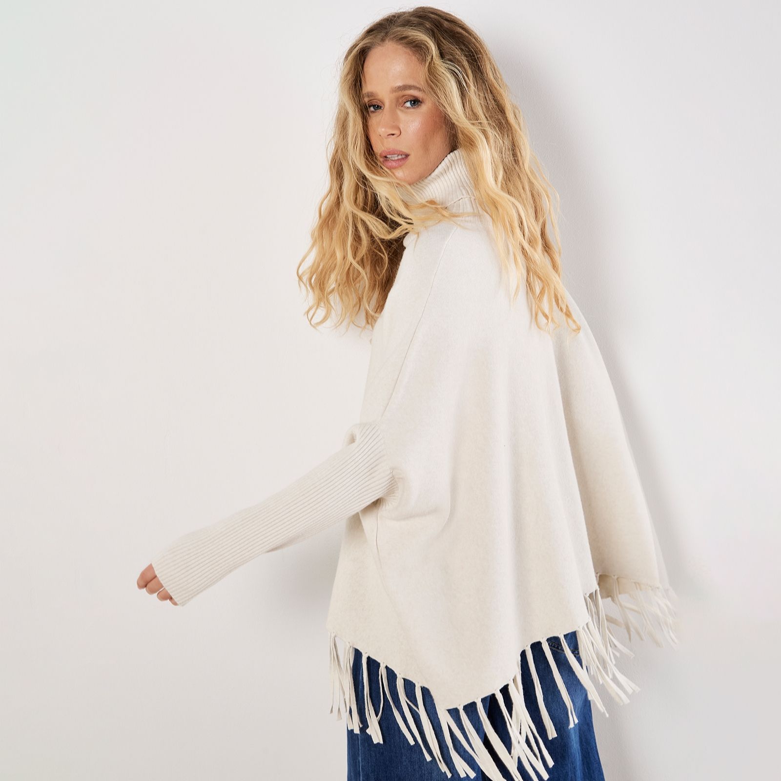 Apricot Roll Neck Fringed Ponch Jumper