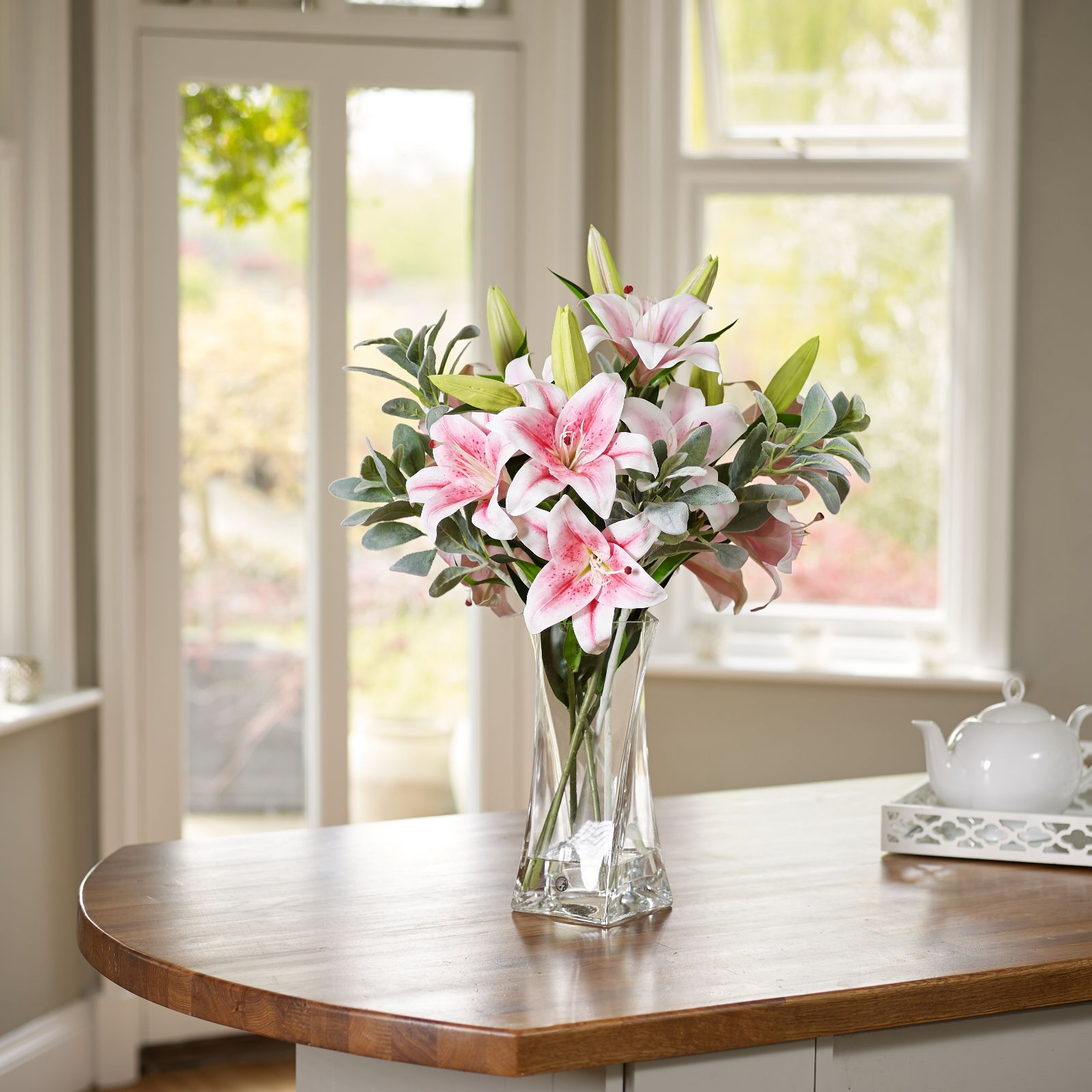 Peony Lilies & Foliage in a Clear Twisted Vase QVC UK