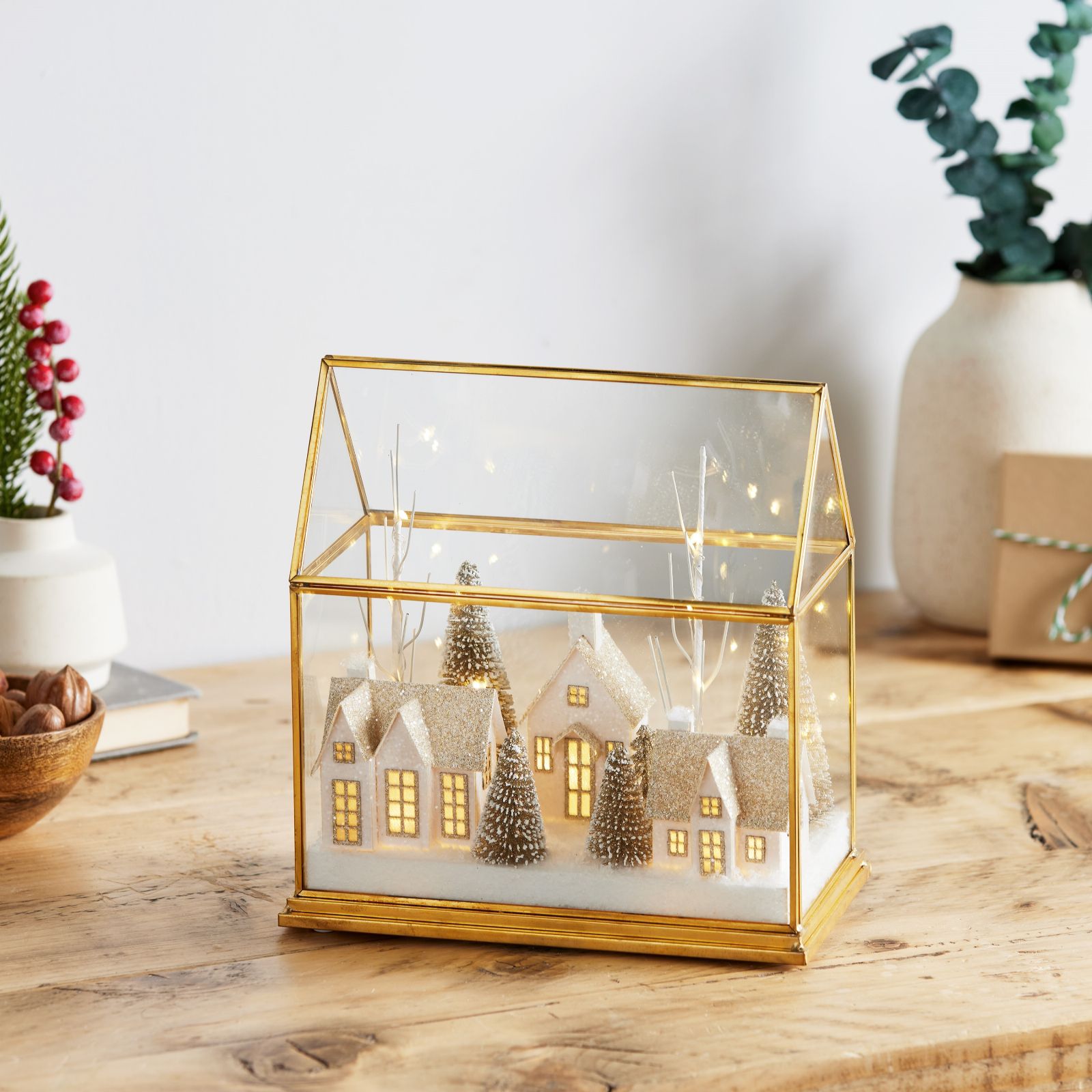 Home Stories Pre Lit Snow Village in Glass House