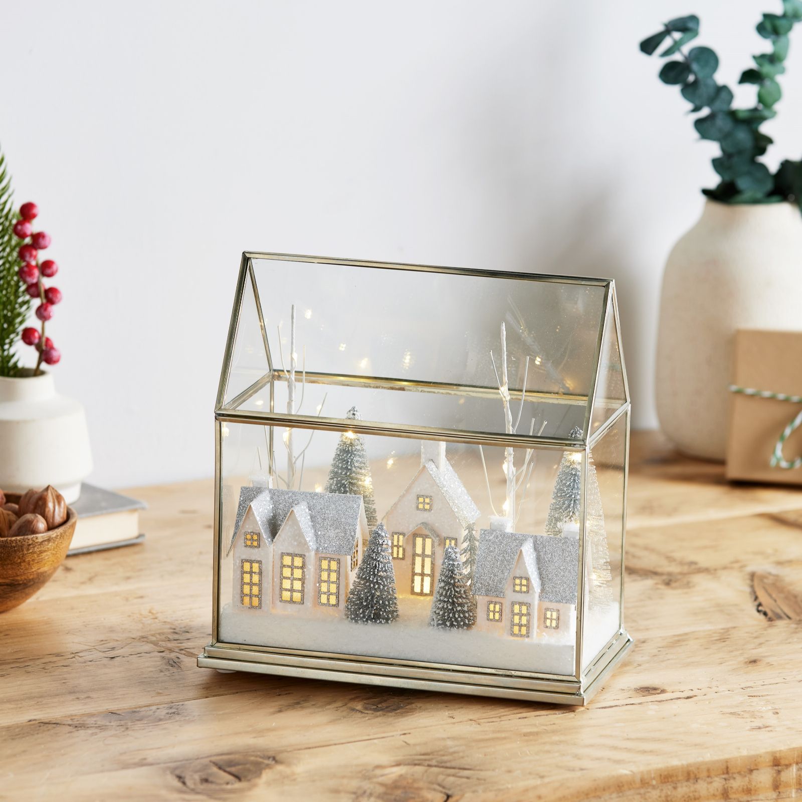 Home Stories Pre Lit Snow Village in Glass House